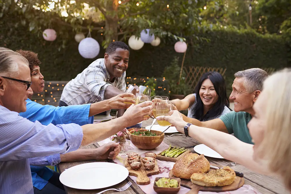 baby-boomers-cheers-wine-older-adults