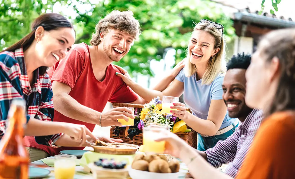millennial-group-young-adults-having-food-drinks-eating-dinner